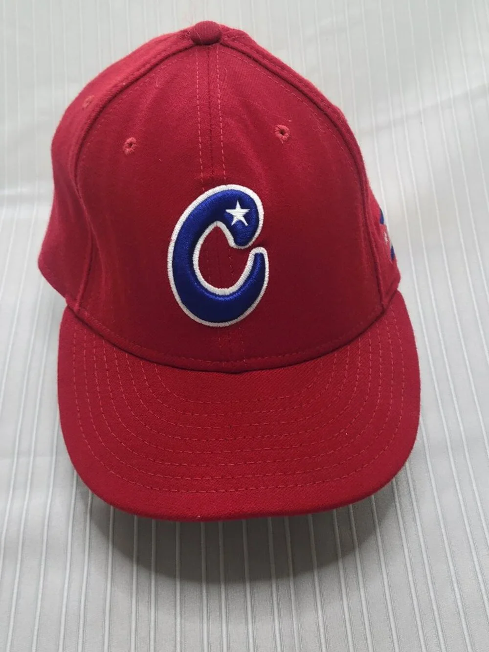 New Era 59FIFTY Cuban baseball cap in red with blue/white 'C' logo with star,